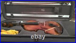 Used Sie Lam Capricoo full size violin with P and H London bow. With case